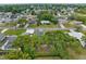 Residential neighborhood with a mix of homes, tree coverage, and well-maintained properties creating a peaceful atmosphere at 5035 Harbinger Rd, Spring Hill, FL 34608