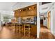 Spacious kitchen with ample counter space, bar stool seating, and wood cabinetry at 5035 Harbinger Rd, Spring Hill, FL 34608