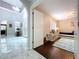 Bright entryway with high ceilings, marble floors, and an arched doorway leading to other parts of the home at 5249 Wellfield Rd, New Port Richey, FL 34655