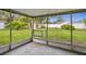 Back porch with view of the yard and shed at 5323 23Rd St, Zephyrhills, FL 33542