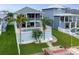 Aerial view of backyard featuring a private pool, patio, and direct access to the waterfront at 6140 Seaside Dr, New Port Richey, FL 34652