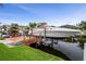 Well-maintained boat docked at a private pier, showcasing waterfront living and recreational opportunities at 6140 Seaside Dr, New Port Richey, FL 34652