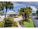 Waterfront community center features lush tropical landscaping in a scenic location at 6140 Seaside Dr, New Port Richey, FL 34652