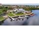 Waterfront community center with boat slips and a pool in a tropical setting at 6140 Seaside Dr, New Port Richey, FL 34652