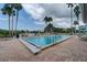 The community pool offers many lounge chairs and a beautiful place to relax at 6140 Seaside Dr, New Port Richey, FL 34652