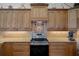 Kitchen with granite countertops, stainless steel appliances, and custom wood cabinets at 6140 Seaside Dr, New Port Richey, FL 34652