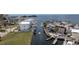 An aerial capture showing a waterfront property with canal access and surrounding community at 6322 Aureau Ave, Hudson, FL 34667