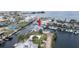 Aerial view of the waterfront property displaying canal access and proximity to open water at 6322 Aureau Ave, Hudson, FL 34667