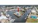 Overhead shot revealing canal-front home with docking facilities near waterfront community at 6322 Aureau Ave, Hudson, FL 34667