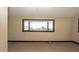 Bedroom with a large window, carpet flooring and a marina view at 6322 Aureau Ave, Hudson, FL 34667
