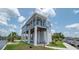 Exterior view of home on stilts, with spiral staircase and boat parking underneath at 6322 Aureau Ave, Hudson, FL 34667