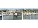 Expansive rooftop deck offering views of the boat dock with white railings at 6322 Aureau Ave, Hudson, FL 34667