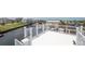 Beautiful water view from rooftop deck featuring white railings, overlooking boat docks and canals at 6322 Aureau Ave, Hudson, FL 34667