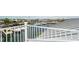 Roof top deck view of boat dock with white railings and panoramic views of the boats at 6322 Aureau Ave, Hudson, FL 34667