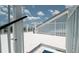 Rooftop deck featuring white railing and panoramic views of the surrounding area at 6322 Aureau Ave, Hudson, FL 34667