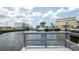Waterfront view from a dock with boats lined up along the canal and homes at 6322 Aureau Ave, Hudson, FL 34667