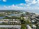 Expansive aerial view of the coastal area with views of waterways, neighborhoods, and the Gulf of Mexico at 639 Garland Cir, Indian Rocks Beach, FL 33785