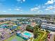 Waterfront community featuring condos with a pool, tennis court, and docks, offering a resort-style living experience at 639 Garland Cir, Indian Rocks Beach, FL 33785