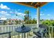Charming waterfront balcony with seating provides a peaceful outdoor retreat with lovely canal views at 639 Garland Cir, Indian Rocks Beach, FL 33785