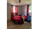 Bedroom with two windows that provides great natural light at 7222 Coventry Dr, Port Richey, FL 34668