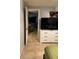 Bedroom featuring tiled floor and an open doorway to the remainder of the home at 7222 Coventry Dr, Port Richey, FL 34668
