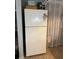 Kitchen featuring a white refrigerator with fun magnets at 7222 Coventry Dr, Port Richey, FL 34668