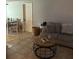 Inviting living room featuring tile flooring and cozy seating at 7222 Coventry Dr, Port Richey, FL 34668