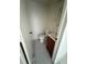 Small bathroom with standard toilet, sink, and tile flooring at 7540 Briarwood Dr, Port Richey, FL 34668