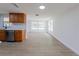 Bright living area adjacent to kitchen with an open layout and plenty of natural light at 7608 Bougenville Dr, Port Richey, FL 34668