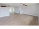 Spacious living area with new floors, freshly painted walls, and ample natural light at 7608 Bougenville Dr, Port Richey, FL 34668