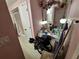 View of pink bathroom featuring a vanity, mirror and walk-in shower at 7631 Briarwood Dr, Port Richey, FL 34668