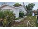Side view of the exterior elevation of the home at 7631 Briarwood Dr, Port Richey, FL 34668