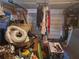 View of the garage which is full of stored items at 7631 Briarwood Dr, Port Richey, FL 34668