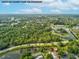 Beautiful aerial view showcasing the community amenities and lush green surroundings of the property at 8158 Sturbridge Ct # D, Weeki Wachee, FL 34613