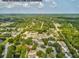 This aerial shows the condo association nestled among lush green trees, offering serene and private living at 8158 Sturbridge Ct # D, Weeki Wachee, FL 34613