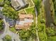 Aerial view of residential area with well-maintained landscaping and community parking at 8158 Sturbridge Ct # D, Weeki Wachee, FL 34613