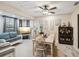 Comfortable dining room area with stylish furniture, decor, and ample natural light, perfect for entertaining at 8158 Sturbridge Ct # D, Weeki Wachee, FL 34613