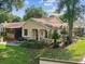 Landscaped front lawn and appealing single-story home at 8158 Sturbridge Ct # D, Weeki Wachee, FL 34613