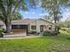 Charming home with a well-manicured lawn, mature trees, and appealing curb appeal at 8158 Sturbridge Ct # D, Weeki Wachee, FL 34613