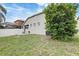 The backyard shows ample space with a partial view of an enclosed pool area at 8335 Crescent Moon Dr, New Port Richey, FL 34655