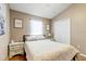 Cozy bedroom features a comfortable bed, matching nightstands, and a closet at 8335 Crescent Moon Dr, New Port Richey, FL 34655