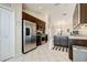Bright kitchen with stainless steel appliances, dark cabinetry, and ample counter space at 8335 Crescent Moon Dr, New Port Richey, FL 34655