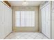 Bright pantry area featuring tile flooring, pantry shelving and coffee/tea station at 8335 Crescent Moon Dr, New Port Richey, FL 34655