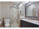 Bathroom featuring custom shower and tile at 8518 Quail Hollow Blvd, Wesley Chapel, FL 33544