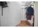 Walk-in closet with shelving and hanging rods at 8518 Quail Hollow Blvd, Wesley Chapel, FL 33544
