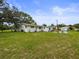 A broad backyard scene with ample space for recreation and relaxation under the sky at 8540 Roseanne Blvd, New Port Richey, FL 34654