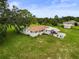 Wide shot of a home showing the patio area and spacious backyard at 8540 Roseanne Blvd, New Port Richey, FL 34654