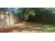 Backyard with a wooden fence and some foliage at 9432 84Th St, Seminole, FL 33777