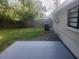 Backyard with a concrete patio and some grass at 9432 84Th St, Seminole, FL 33777