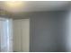 View of a bedroom closet featuring light paint and vinyl flooring at 9432 84Th St, Seminole, FL 33777